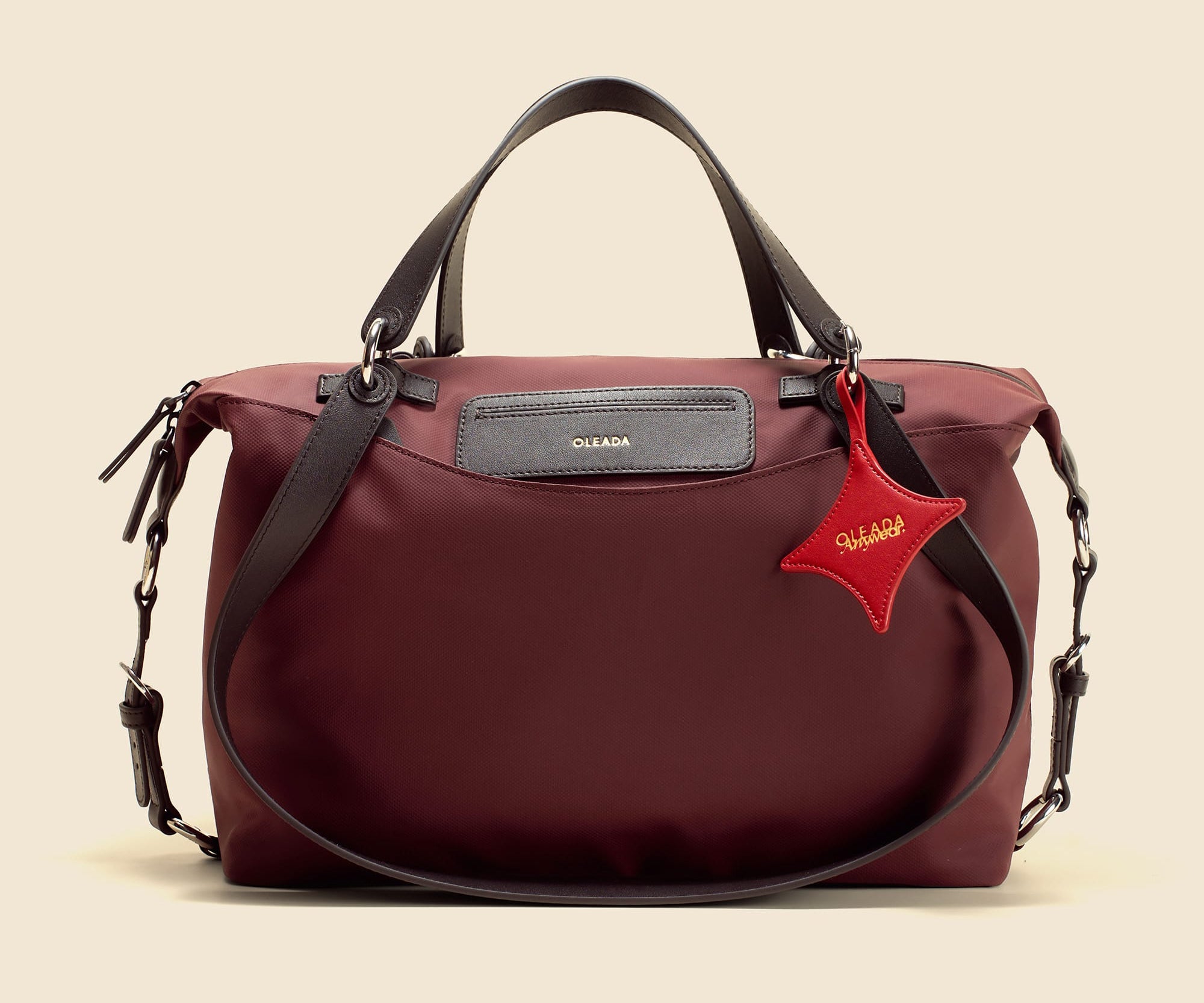 OLEADA NYC convertible travel bags > airport tote bags > overnight bags > water-resistant vegan bags > stylish multi-use bags Color_Bordeaux AnyWear AnyDuffle - Regular Size