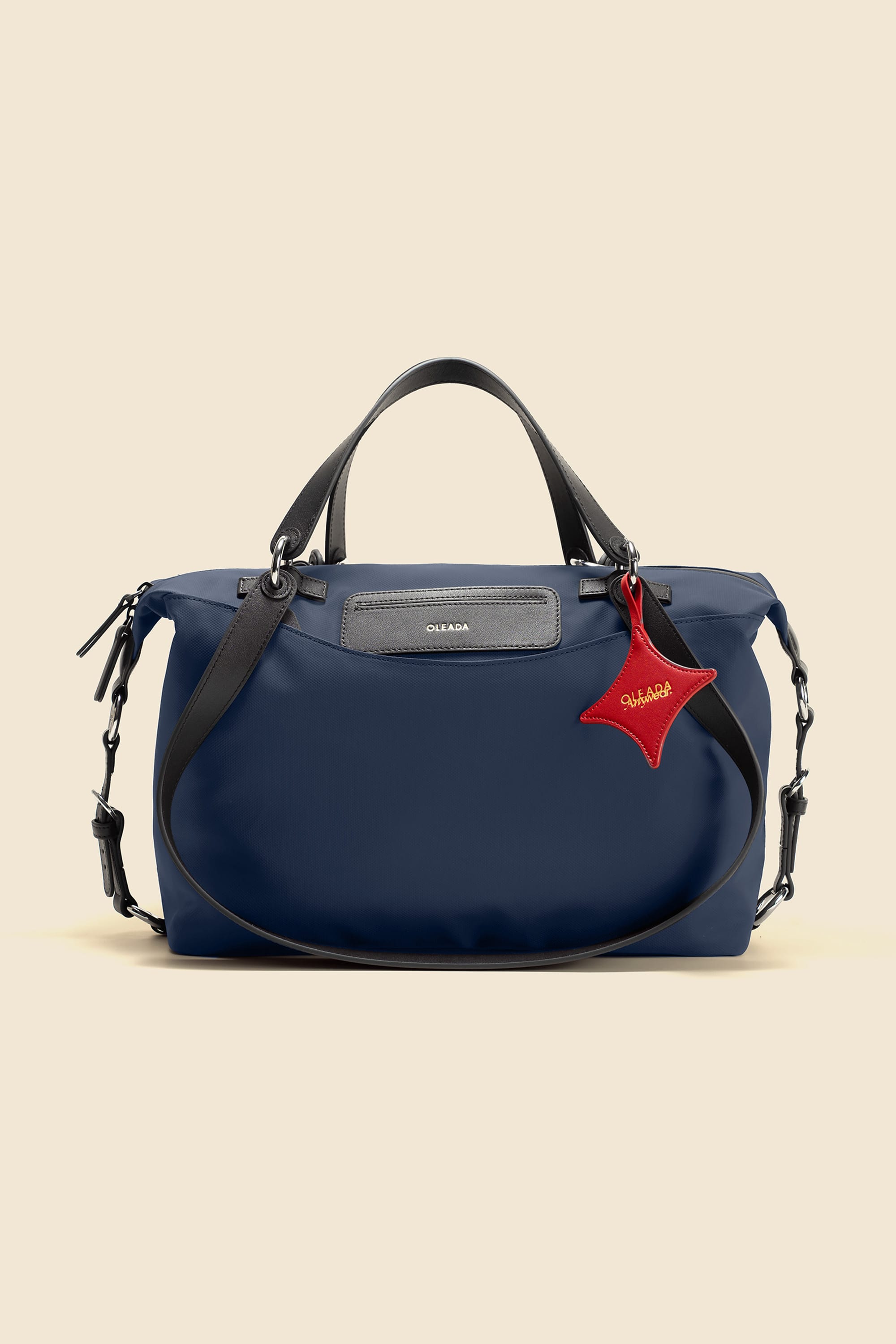 OLEADA NYC convertible travel bags > airport tote bags > overnight bags > water-resistant vegan bags > stylish multi-use bags Color_Mykonos AnyWear AnyDuffle - Regular Size