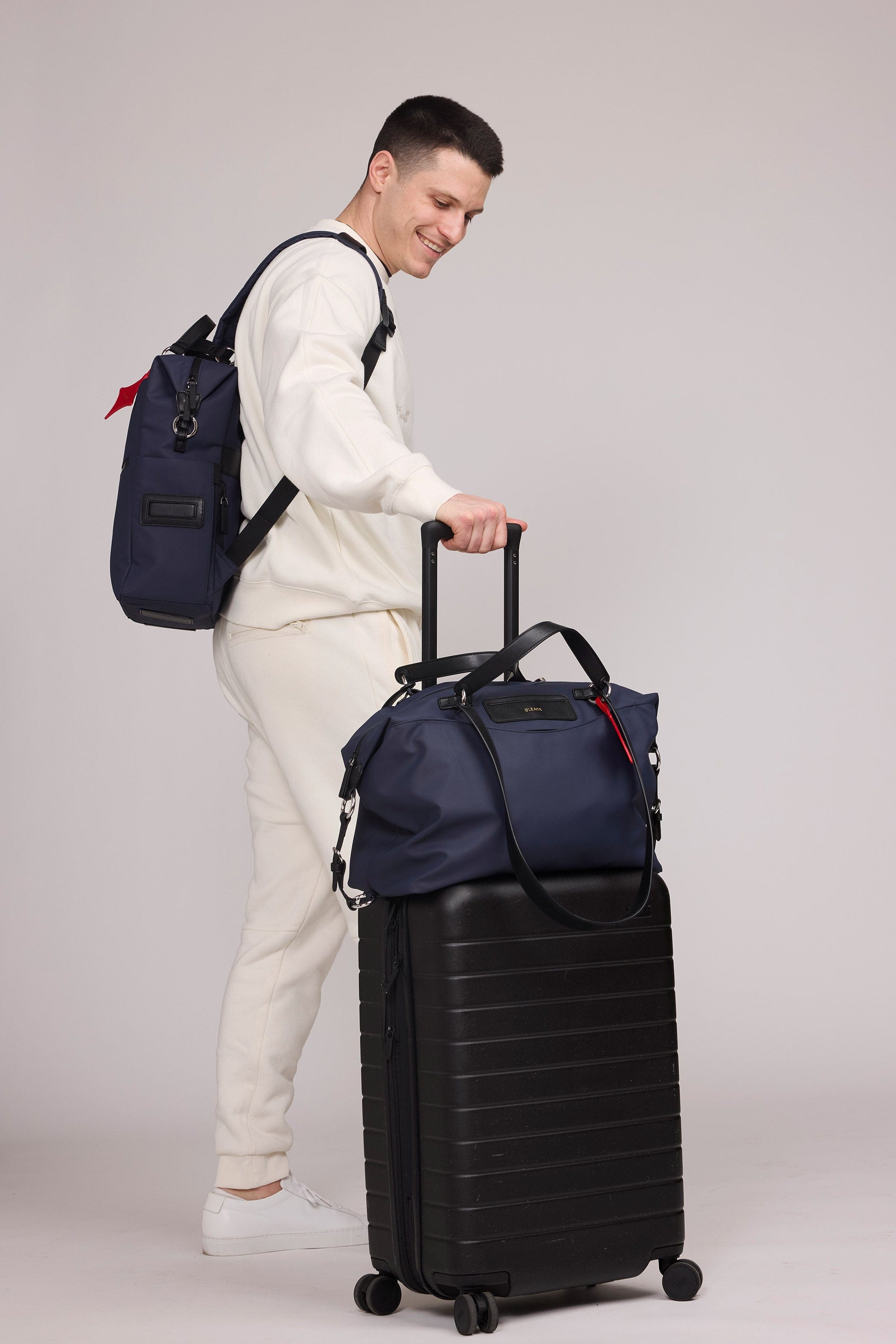 OLEADA NYC convertible travel bags > work-to-travel backpack > commuter bags > water-resistant vegan bags > stylish multi-use backpack AnyWear AnyBackpack