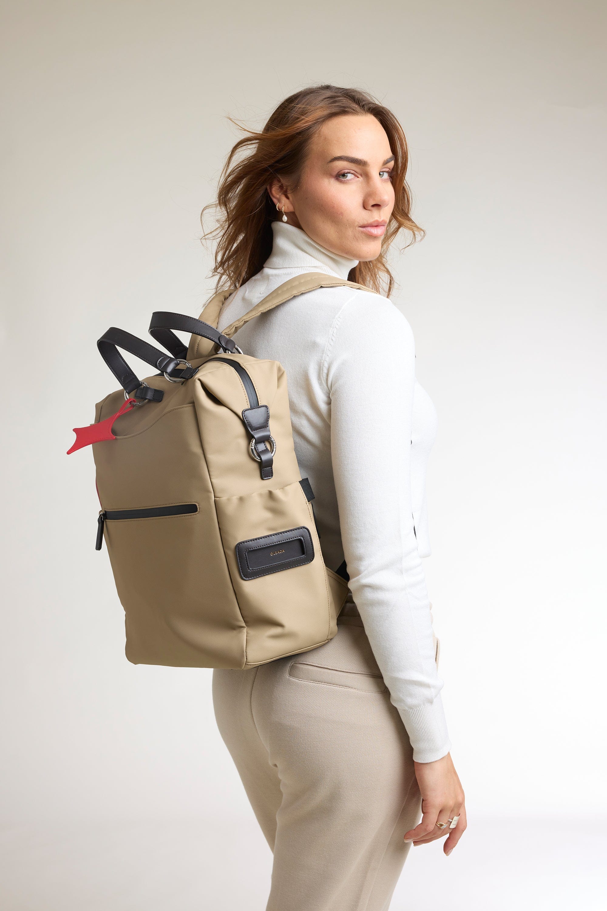 OLEADA NYC convertible travel bags > work-to-travel backpack > commuter bags > water-resistant vegan bags > stylish multi-use backpack AnyWear AnyBackpack