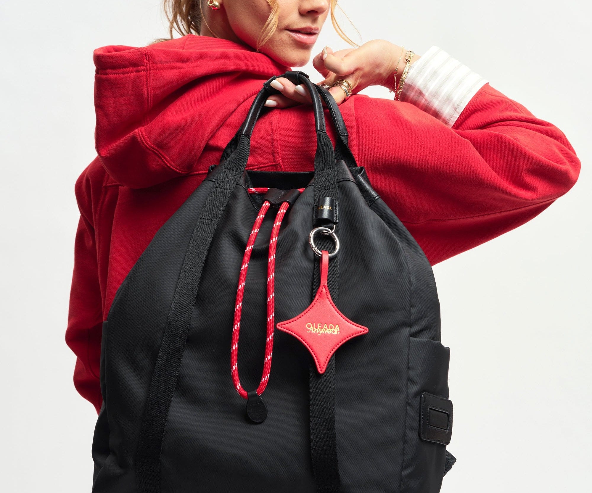 OLEADA NYC convertible travel bags > work-to-travel backpack > commuter bags > water-resistant vegan bags > stylish multi-use backpack AnyWear Tennis Backpack