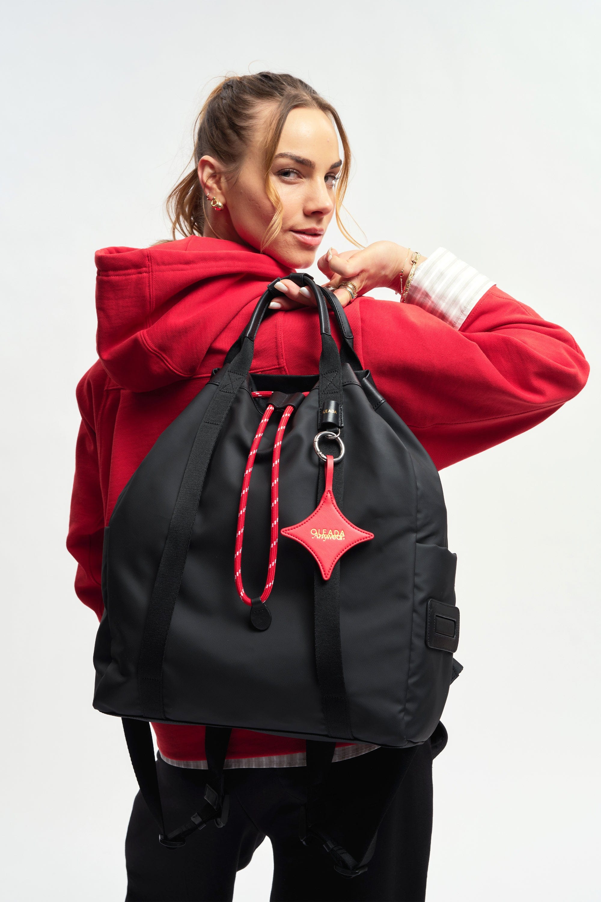 OLEADA NYC convertible travel bags > work-to-travel backpack > commuter bags > water-resistant vegan bags > stylish multi-use backpack AnyWear Tennis Backpack