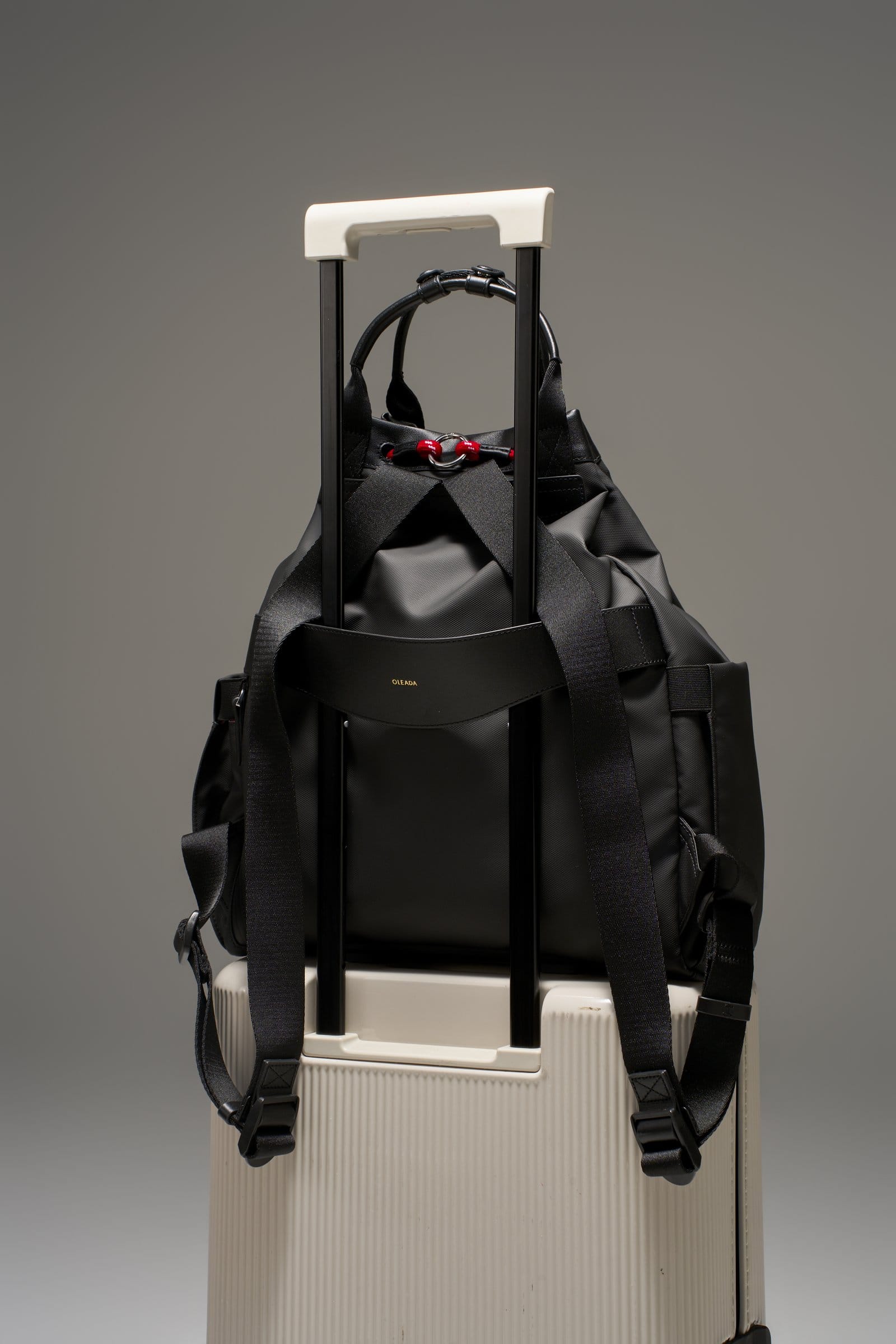 OLEADA NYC convertible travel bags > work-to-travel backpack > commuter bags > water-resistant vegan bags > stylish multi-use backpack AnyWear Tennis Backpack