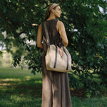 OLEADA NYC convertible travel bags > work-to-travel backpack > commuter bags > water-resistant vegan bags > stylish multi-use backpack Color_Abu Dhabi AnyWear Tennis Backpack