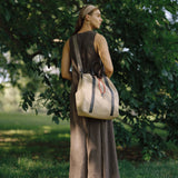 OLEADA NYC convertible travel bags > work-to-travel backpack > commuter bags > water-resistant vegan bags > stylish multi-use backpack Color_Abu Dhabi AnyWear Tennis Backpack