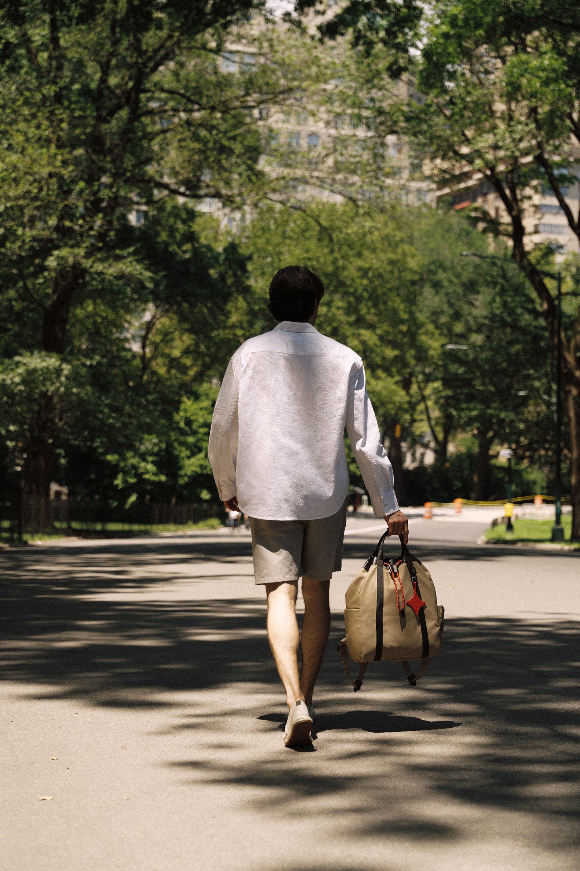 OLEADA NYC convertible travel bags > work-to-travel backpack > commuter bags > water-resistant vegan bags > stylish multi-use backpack Color_Abu Dhabi AnyWear Tennis Backpack