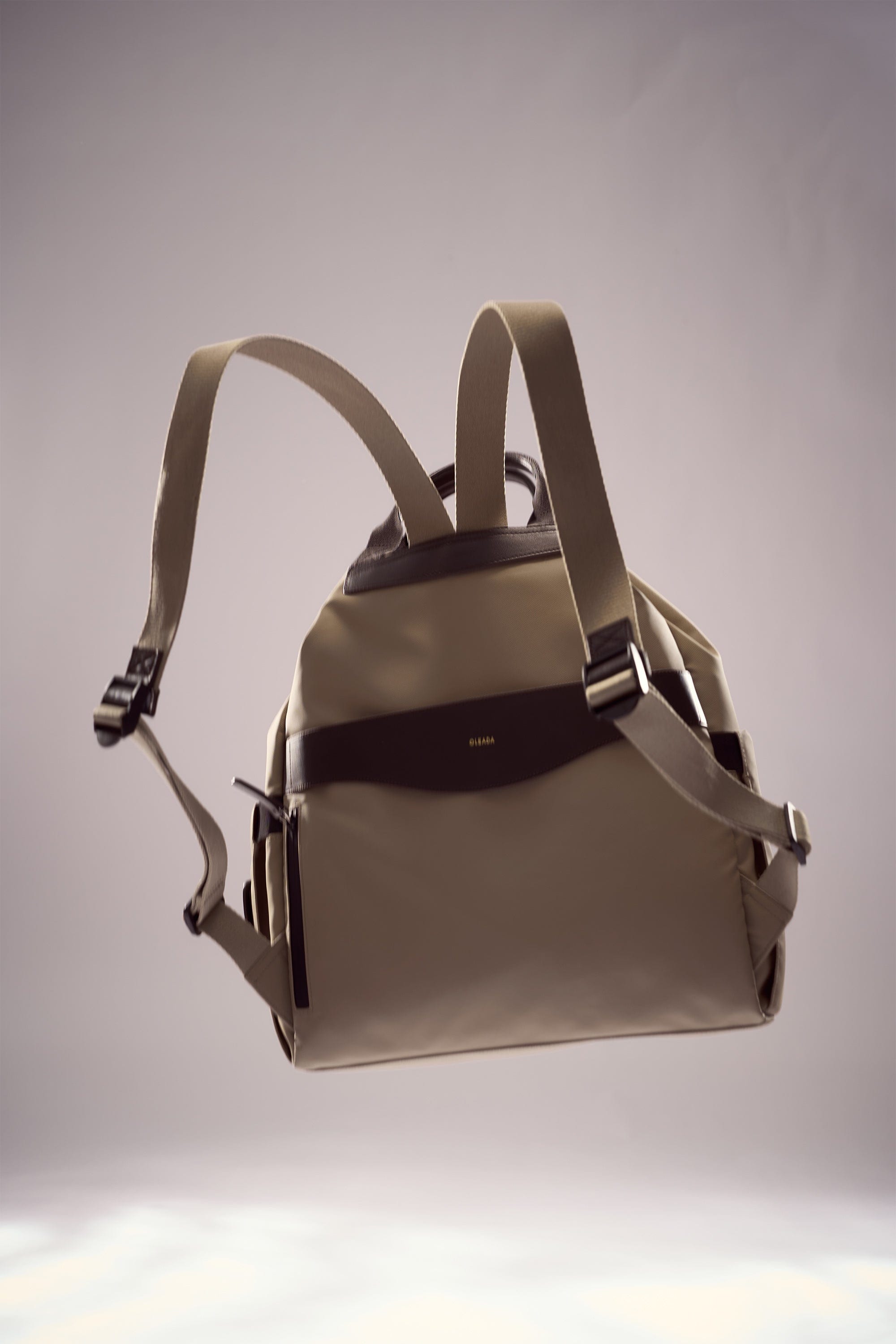 OLEADA NYC convertible travel bags > work-to-travel backpack > commuter bags > water-resistant vegan bags > stylish multi-use backpack Color_Abu Dhabi AnyWear Tennis Backpack