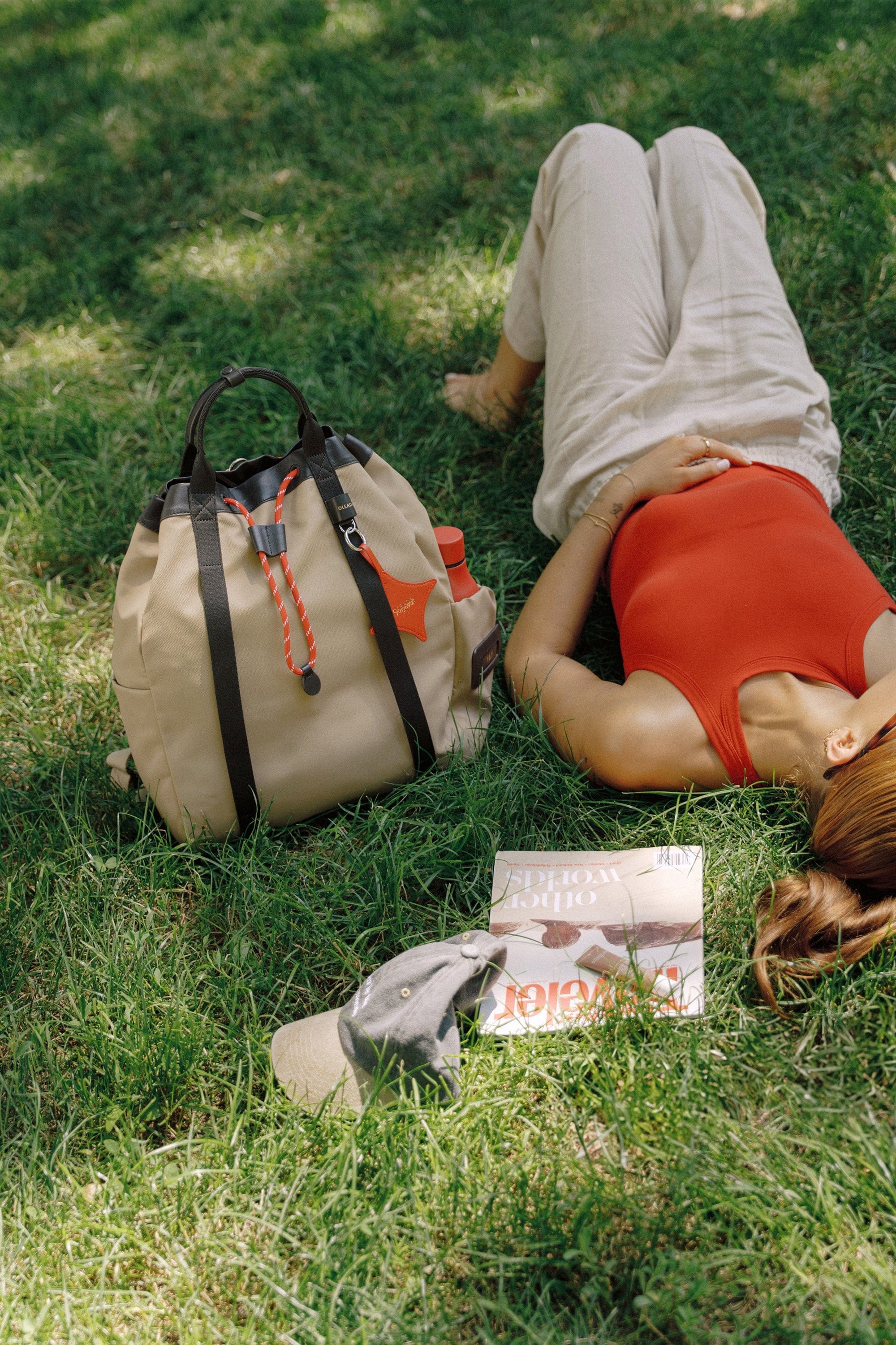 OLEADA NYC convertible travel bags > work-to-travel backpack > commuter bags > water-resistant vegan bags > stylish multi-use backpack Color_Abu Dhabi AnyWear Tennis Backpack