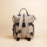 OLEADA NYC Convertible Travel Bags > Work-to-Travel Backpack > Organized Carry Bags > Water-Resistant Vegan Bags > Stylish Multi-Use Backpack Color_Tan Anywear AnyBackpack