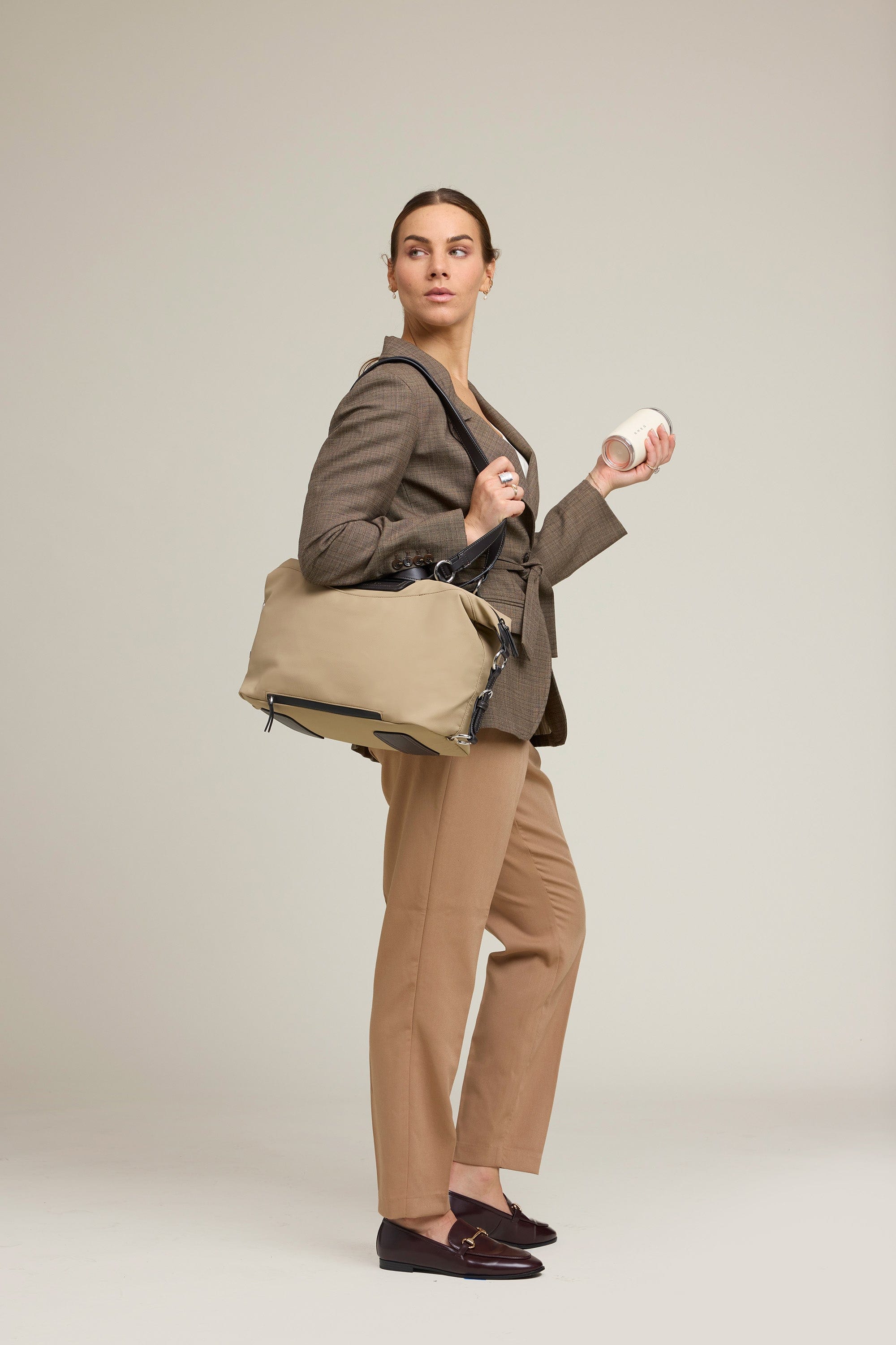OLEADA NYC Convertible Travel Bags > Work-to-Travel Duffle Bags > Organized Carry Bags > Water-Resistant Vegan Bags > Stylish Multi-Use Bags Color_Tan Anywear AnyDuffle City