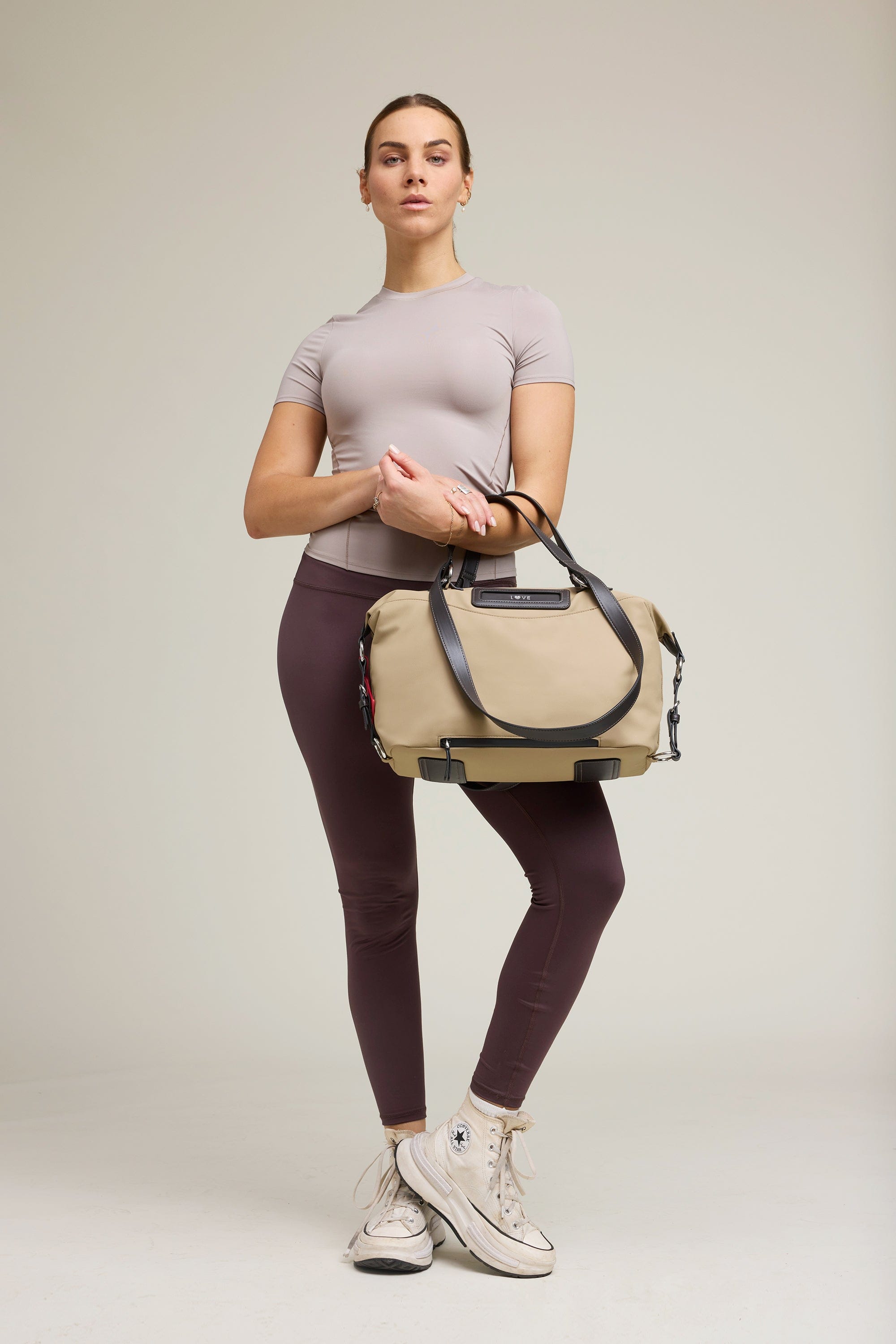 OLEADA NYC Convertible Travel Bags > Work-to-Travel Duffle Bags > Organized Carry Bags > Water-Resistant Vegan Bags > Stylish Multi-Use Bags Color_Tan Anywear AnyDuffle City