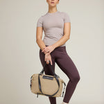 OLEADA NYC Convertible Travel Bags > Work-to-Travel Duffle Bags > Organized Carry Bags > Water-Resistant Vegan Bags > Stylish Multi-Use Bags Color_Tan Anywear AnyDuffle City