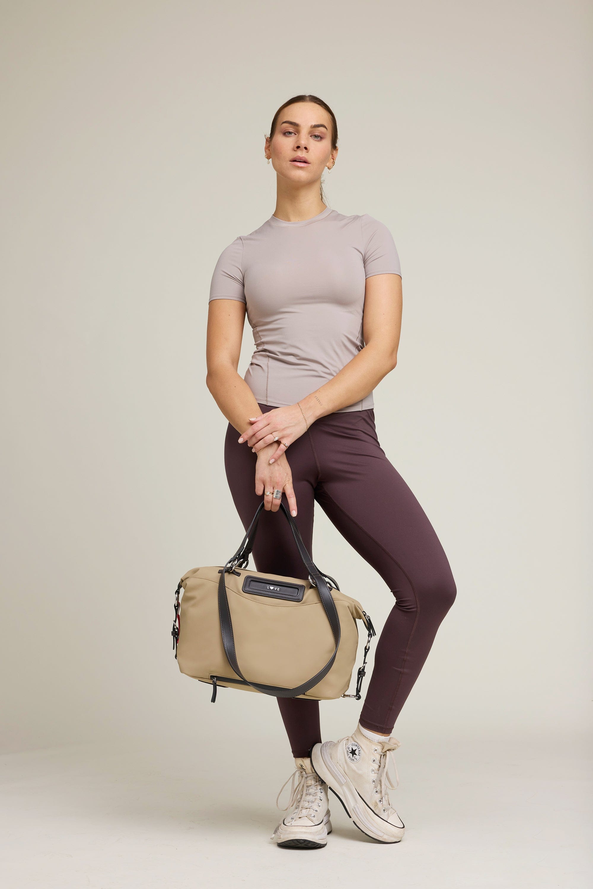 OLEADA NYC Convertible Travel Bags > Work-to-Travel Duffle Bags > Organized Carry Bags > Water-Resistant Vegan Bags > Stylish Multi-Use Bags Color_Tan Anywear AnyDuffle City