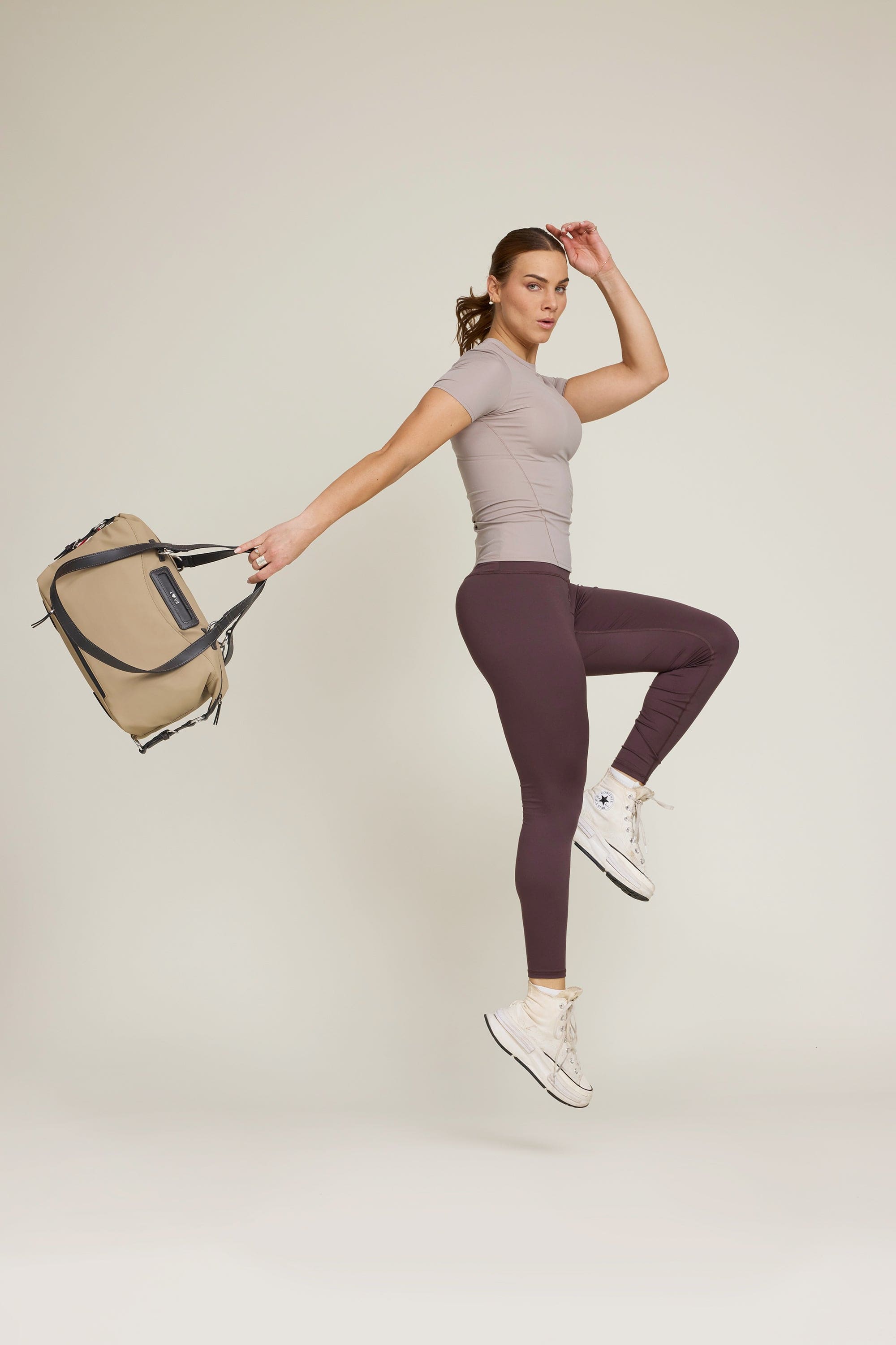 OLEADA NYC Convertible Travel Bags > Work-to-Travel Duffle Bags > Organized Carry Bags > Water-Resistant Vegan Bags > Stylish Multi-Use Bags Color_Tan Anywear AnyDuffle City