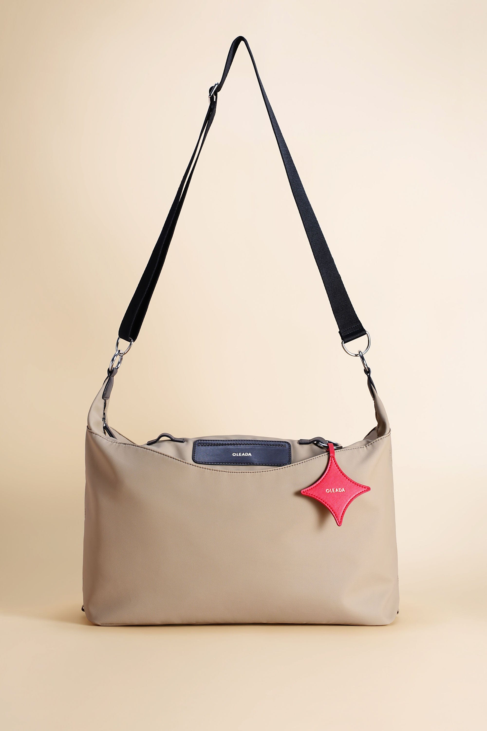 OLEADA NYC Convertible Travel Bags > Work-to-Travel Duffle Bags > Organized Carry Bags > Water-Resistant Vegan Bags > Stylish Multi-Use Bags Color_Tan Anywear AnyDuffle Travel