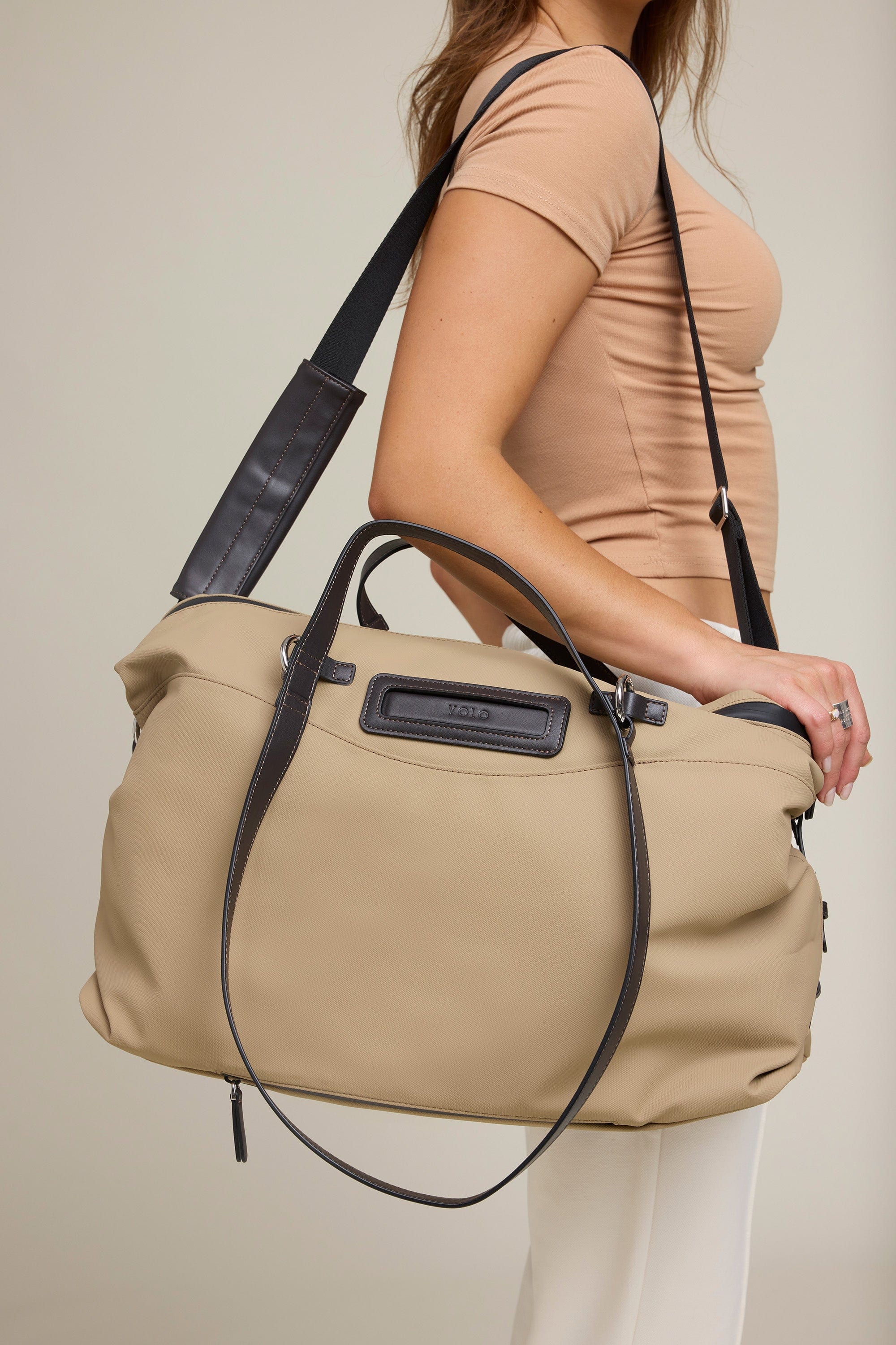 OLEADA NYC Convertible Travel Bags > Work-to-Travel Duffle Bags > Organized Carry Bags > Water-Resistant Vegan Bags > Stylish Multi-Use Bags Color_Tan Anywear AnyDuffle Travel