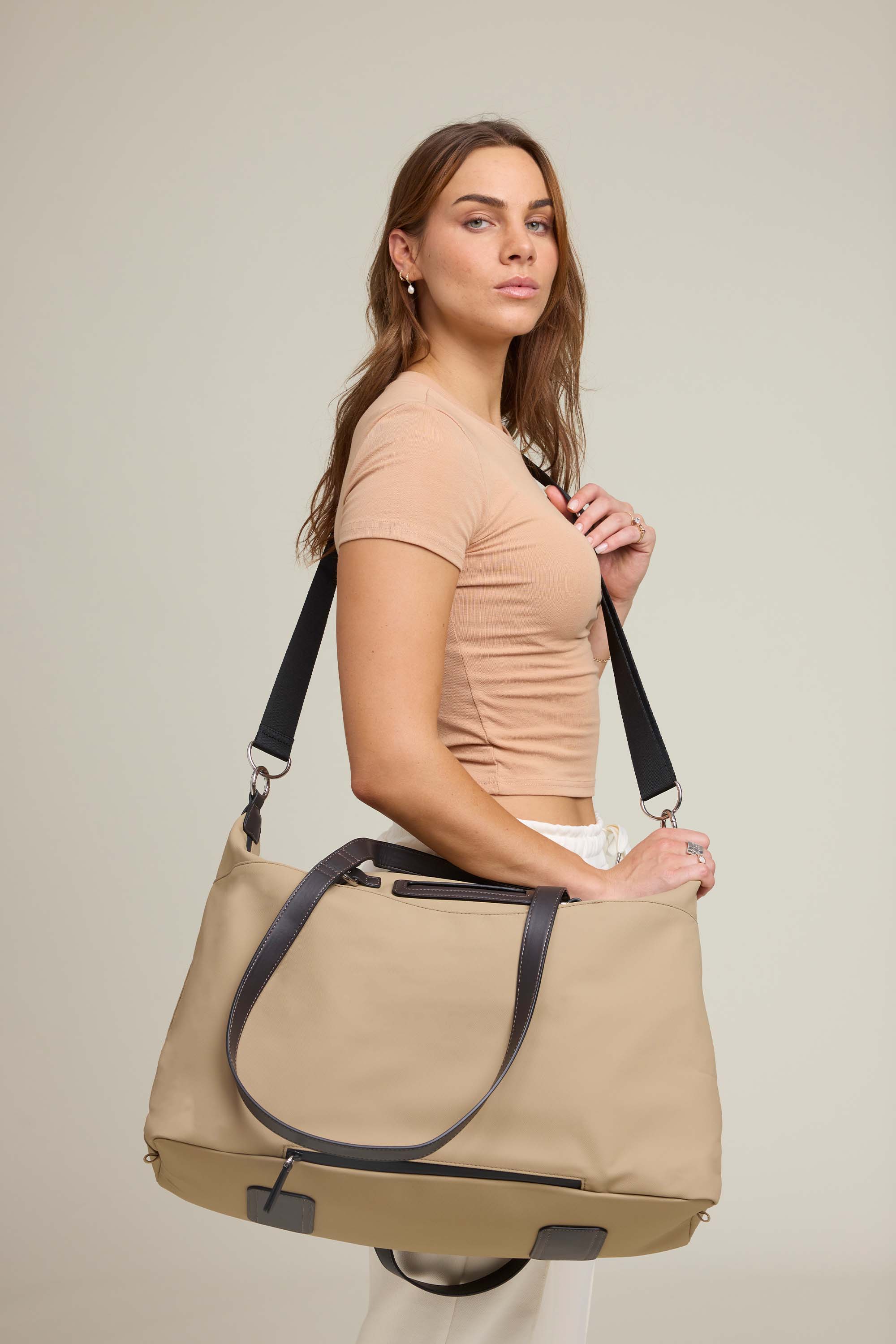 OLEADA NYC Convertible Travel Bags > Work-to-Travel Duffle Bags > Organized Carry Bags > Water-Resistant Vegan Bags > Stylish Multi-Use Bags Color_Tan Anywear AnyDuffle Travel