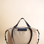 OLEADA NYC Convertible Travel Bags > Work-to-Travel Duffle Bags > Organized Carry Bags > Water-Resistant Vegan Bags > Stylish Multi-Use Bags Color_Tan Anywear AnyDuffle Travel