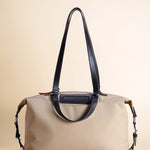 OLEADA NYC Convertible Travel Bags > Work-to-Travel Duffle Bags > Organized Carry Bags > Water-Resistant Vegan Bags > Stylish Multi-Use Bags Color_Tan Anywear AnyDuffle Travel