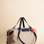 OLEADA NYC Convertible Travel Bags > Work-to-Travel Duffle Bags > Organized Carry Bags > Water-Resistant Vegan Bags > Stylish Multi-Use Bags Color_Tan Anywear AnyDuffle Travel