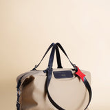 OLEADA NYC Convertible Travel Bags > Work-to-Travel Duffle Bags > Organized Carry Bags > Water-Resistant Vegan Bags > Stylish Multi-Use Bags Color_Tan Anywear AnyDuffle Travel