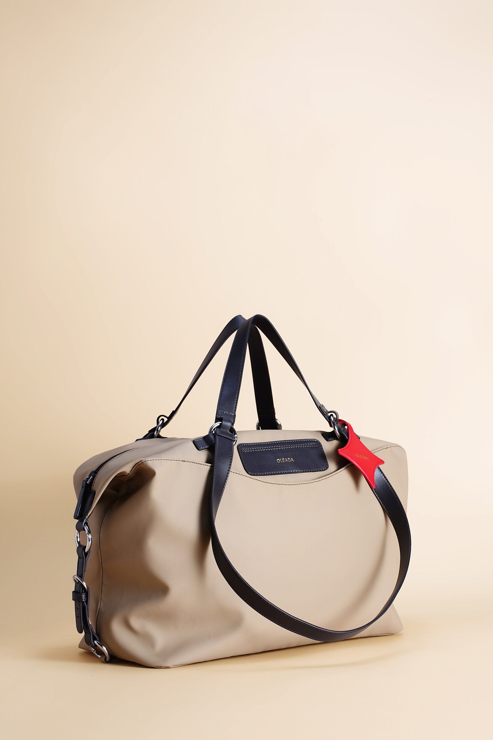 OLEADA NYC Convertible Travel Bags > Work-to-Travel Duffle Bags > Organized Carry Bags > Water-Resistant Vegan Bags > Stylish Multi-Use Bags Color_Tan Anywear AnyDuffle Travel