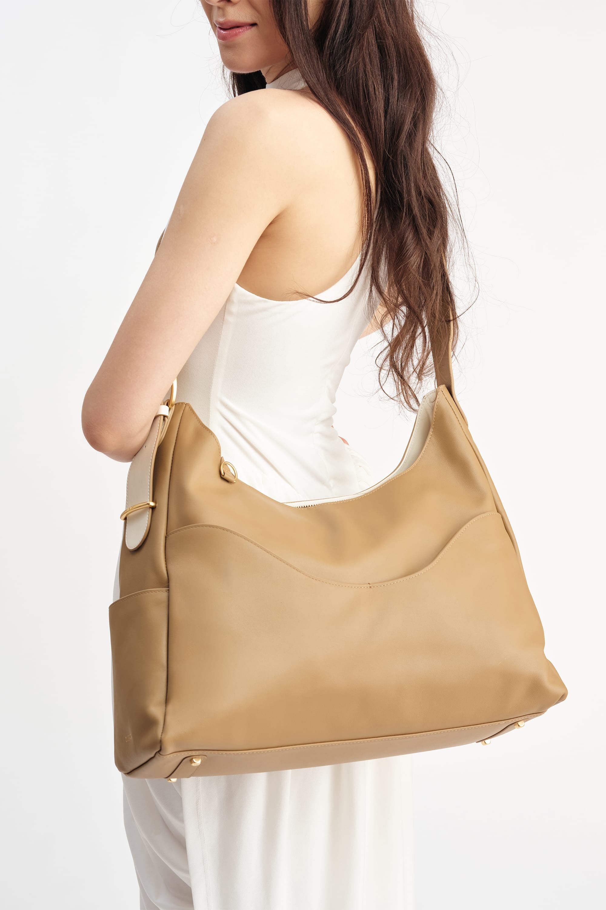 OLEADA NYC Mini Hobo Bag > Women Leather Bag For All Occasions > multiple interior and exterior pockets with a laptop compartment > 13 inch laptop bag > convertible to shoulder bag Reverie Hobo