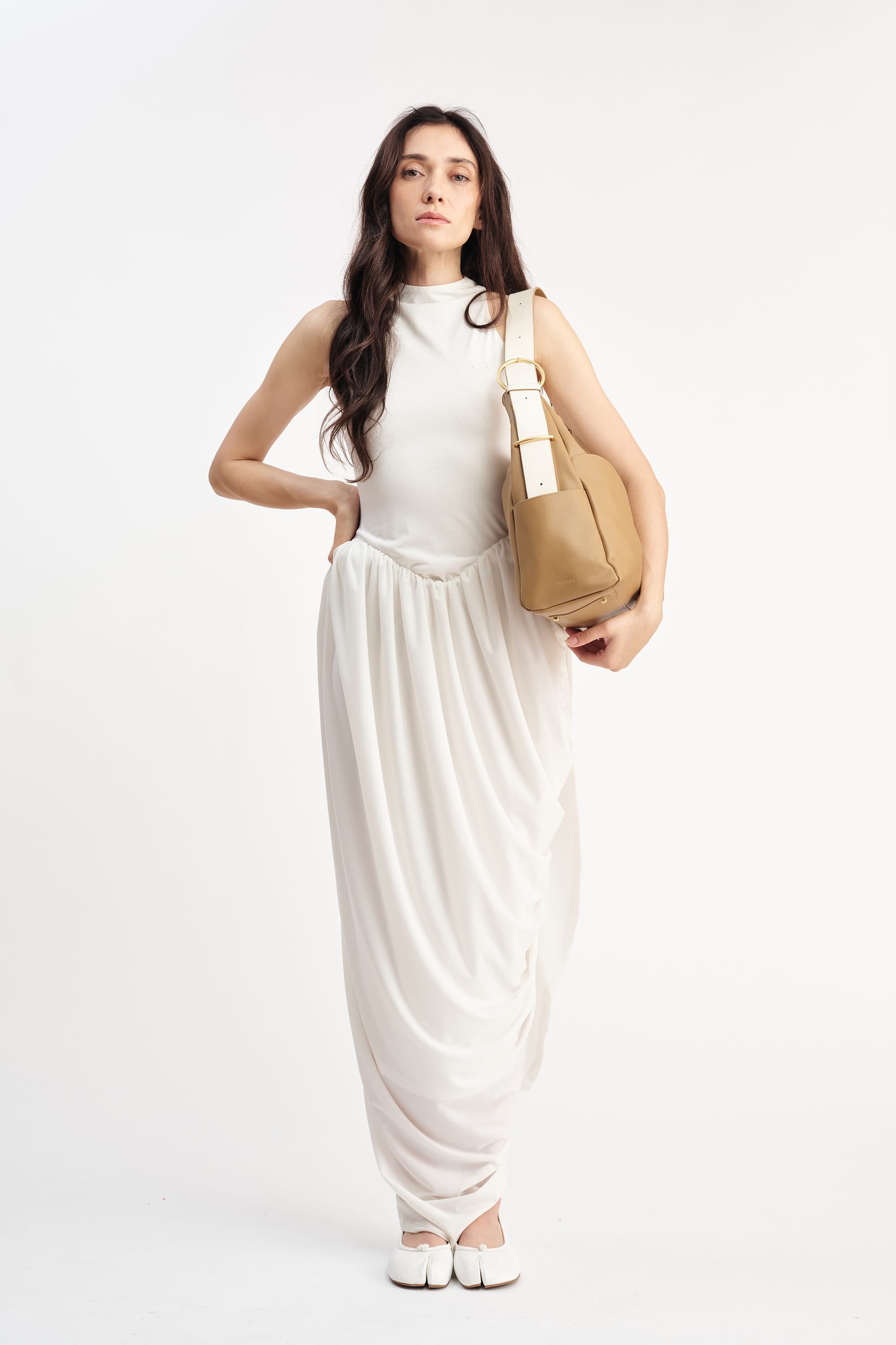 OLEADA NYC Mini Hobo Bag > Women Leather Bag For All Occasions > multiple interior and exterior pockets with a laptop compartment > 13 inch laptop bag > convertible to shoulder bag Reverie Hobo