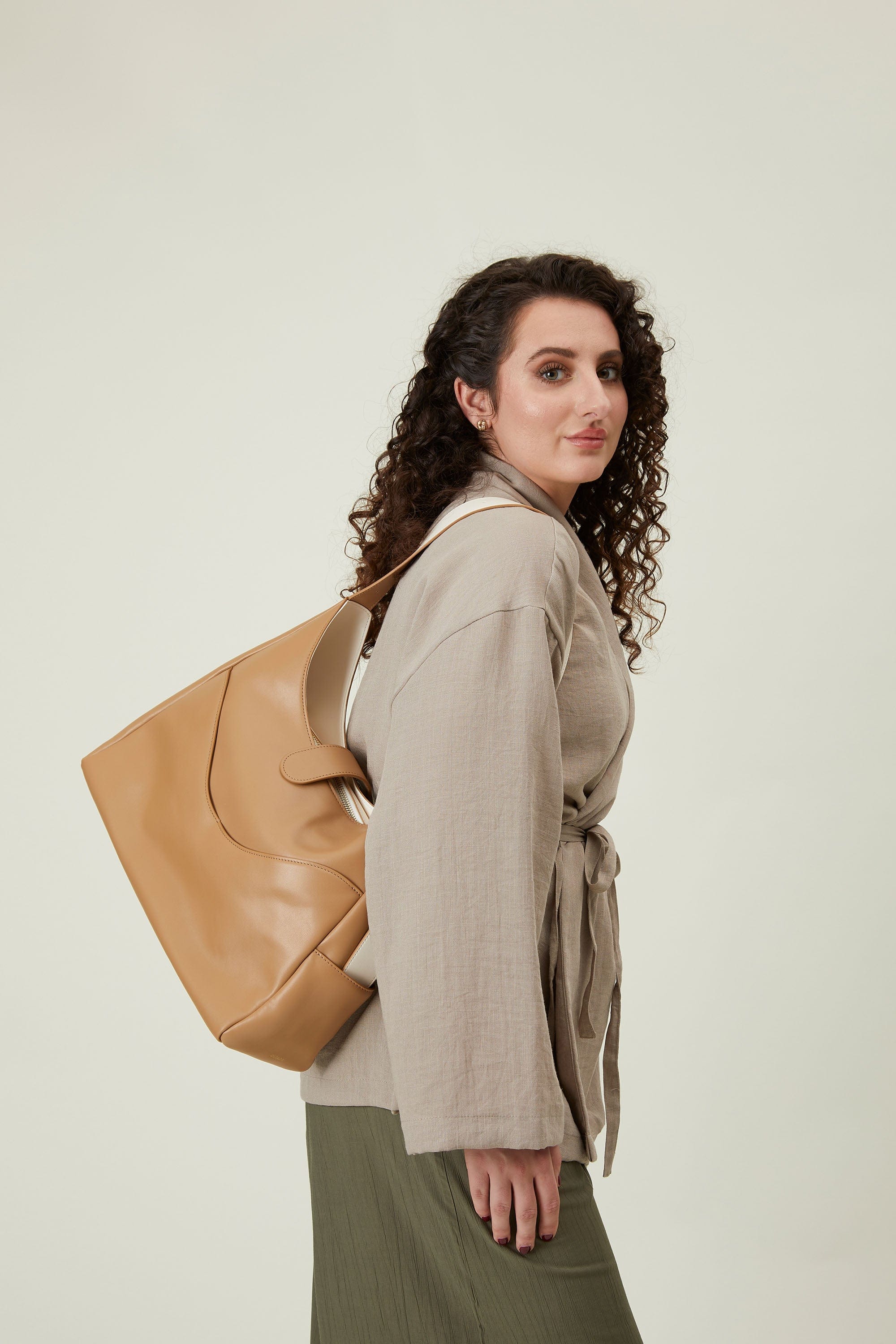 OLEADA NYC Mini Hobo Bag > Women Leather Bag For All Occasions > multiple interior and exterior pockets with a laptop compartment > 13 inch laptop bag > convertible to shoulder bag Reverie Hobo