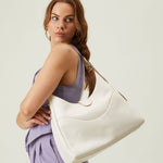 OLEADA NYC Mini Hobo Bag > Women Leather Bag For All Occasions > multiple interior and exterior pockets with a laptop compartment > 13 inch laptop bag > convertible to shoulder bag Reverie Hobo