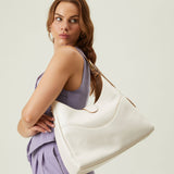 OLEADA NYC Mini Hobo Bag > Women Leather Bag For All Occasions > multiple interior and exterior pockets with a laptop compartment > 13 inch laptop bag > convertible to shoulder bag Reverie Hobo