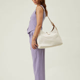 OLEADA NYC Mini Hobo Bag > Women Leather Bag For All Occasions > multiple interior and exterior pockets with a laptop compartment > 13 inch laptop bag > convertible to shoulder bag Reverie Hobo