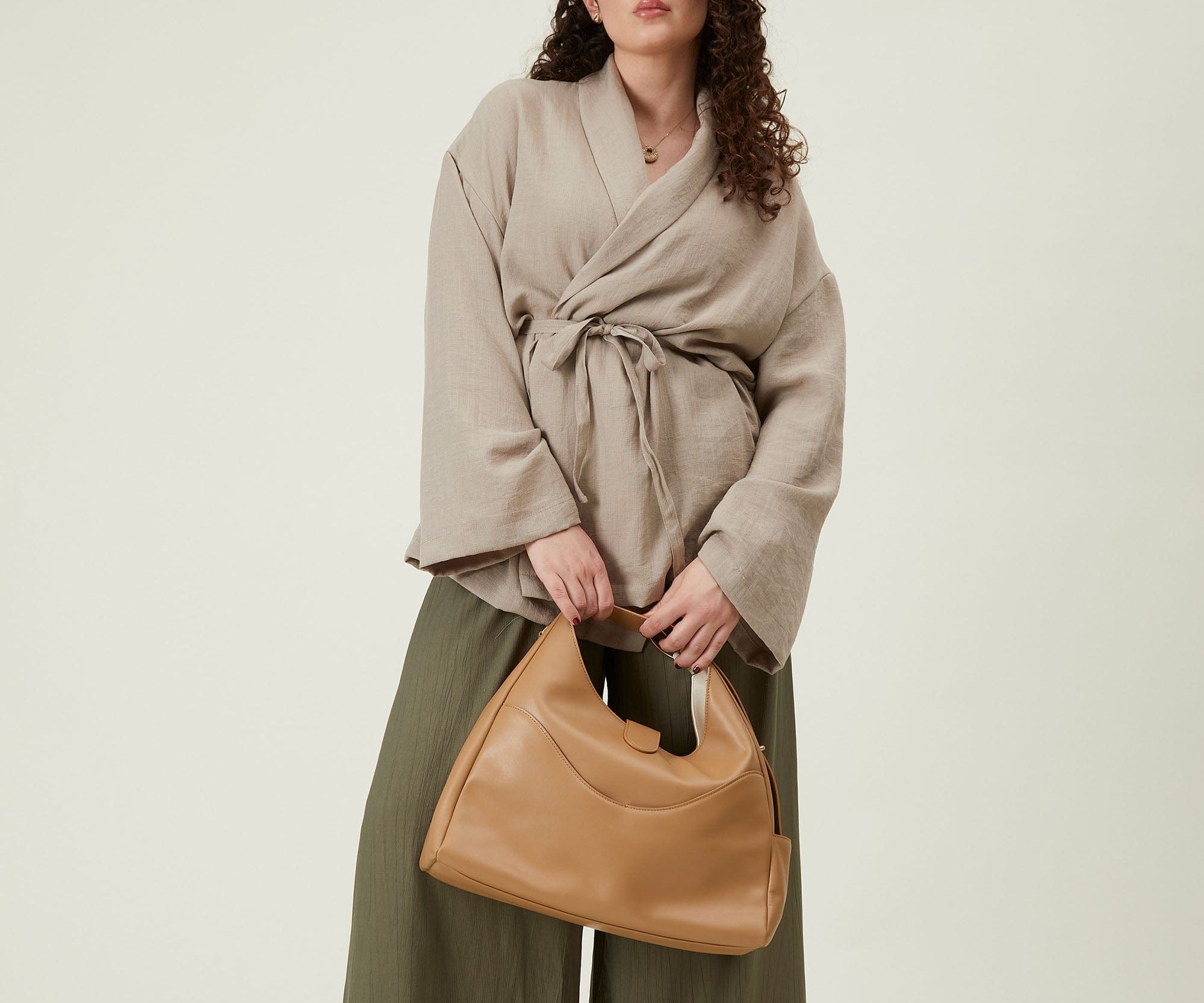 OLEADA NYC Mini Hobo Bag > Women Leather Bag For All Occasions > multiple interior and exterior pockets with a laptop compartment > 13 inch laptop bag > convertible to shoulder bag Reverie Hobo