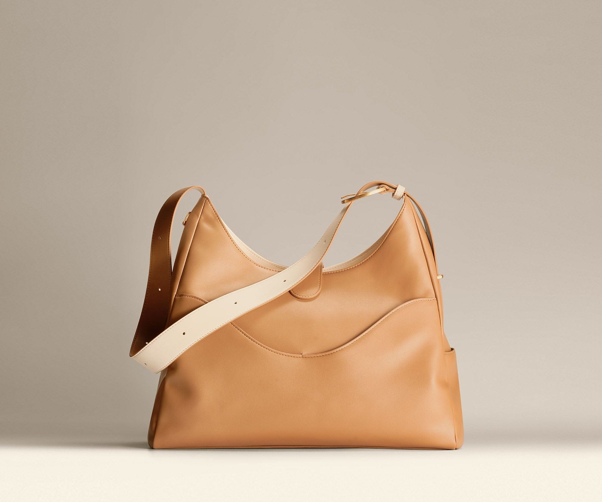 OLEADA NYC Mini Hobo Bag > Women Leather Bag For All Occasions > multiple interior and exterior pockets with a laptop compartment > 13 inch laptop bag > convertible to shoulder bag Reverie Hobo