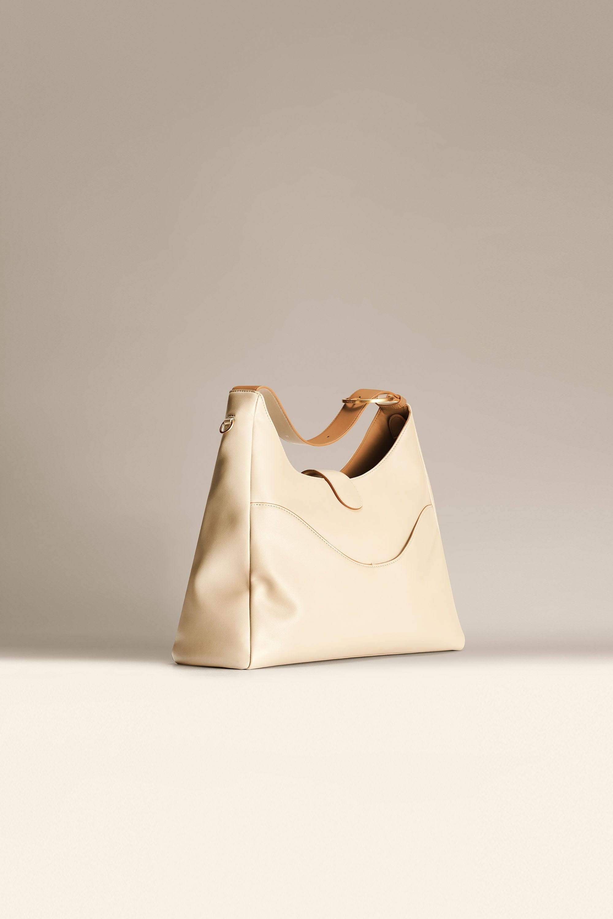 OLEADA NYC Mini Hobo Bag > Women Leather Bag For All Occasions > multiple interior and exterior pockets with a laptop compartment > 13 inch laptop bag > convertible to shoulder bag Reverie Hobo