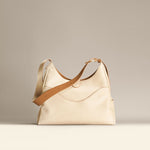 OLEADA NYC Mini Hobo Bag > Women Leather Bag For All Occasions > multiple interior and exterior pockets with a laptop compartment > 13 inch laptop bag > convertible to shoulder bag Reverie Hobo