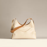 OLEADA NYC Mini Hobo Bag > Women Leather Bag For All Occasions > multiple interior and exterior pockets with a laptop compartment > 13 inch laptop bag > convertible to shoulder bag Reverie Hobo