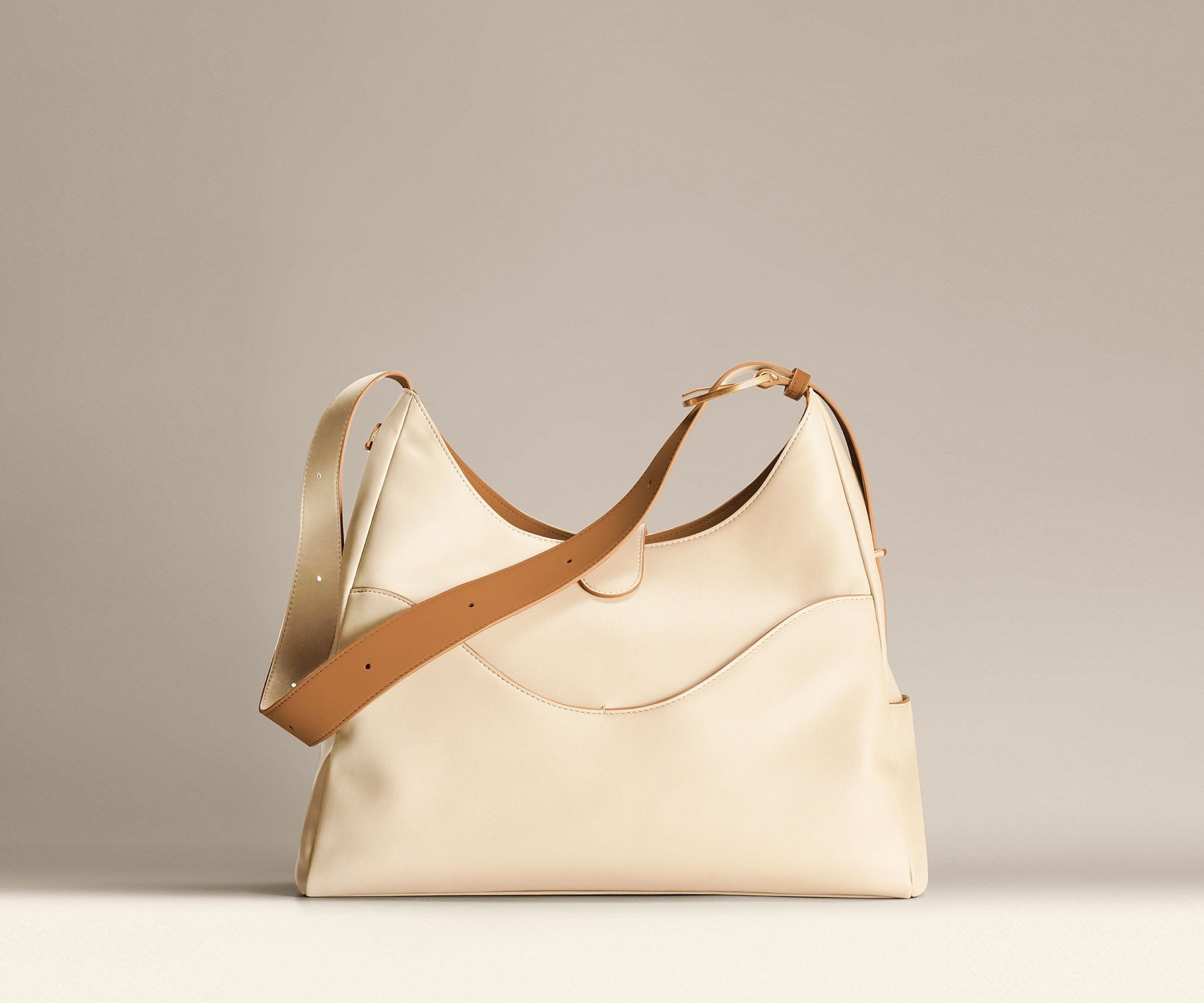 OLEADA NYC Mini Hobo Bag > Women Leather Bag For All Occasions > multiple interior and exterior pockets with a laptop compartment > 13 inch laptop bag > convertible to shoulder bag Reverie Hobo